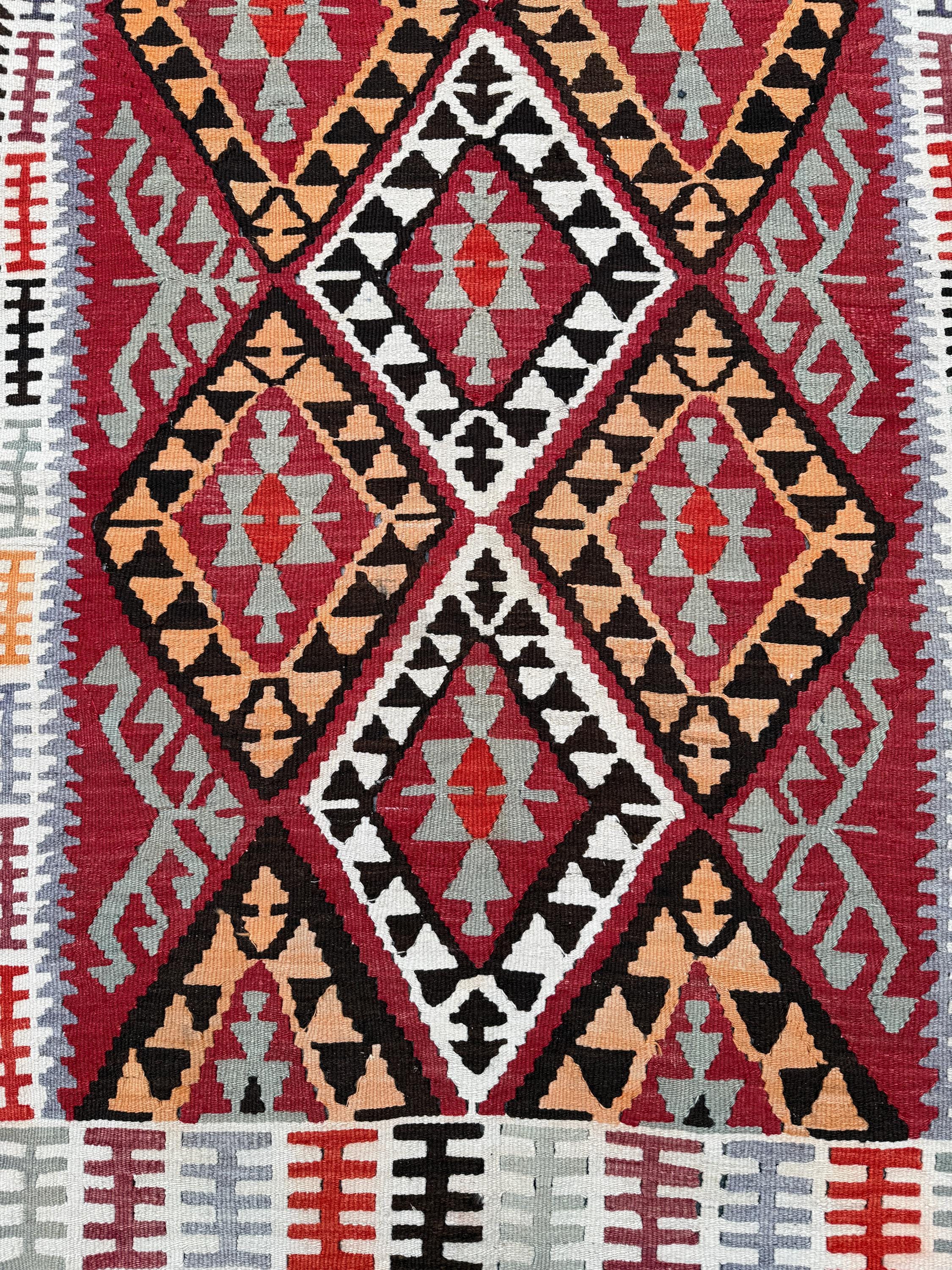 Vintage Handwoven Turkish Kilim Rug: Tarak Motif Wall Hanging (3.44x9.38ft)