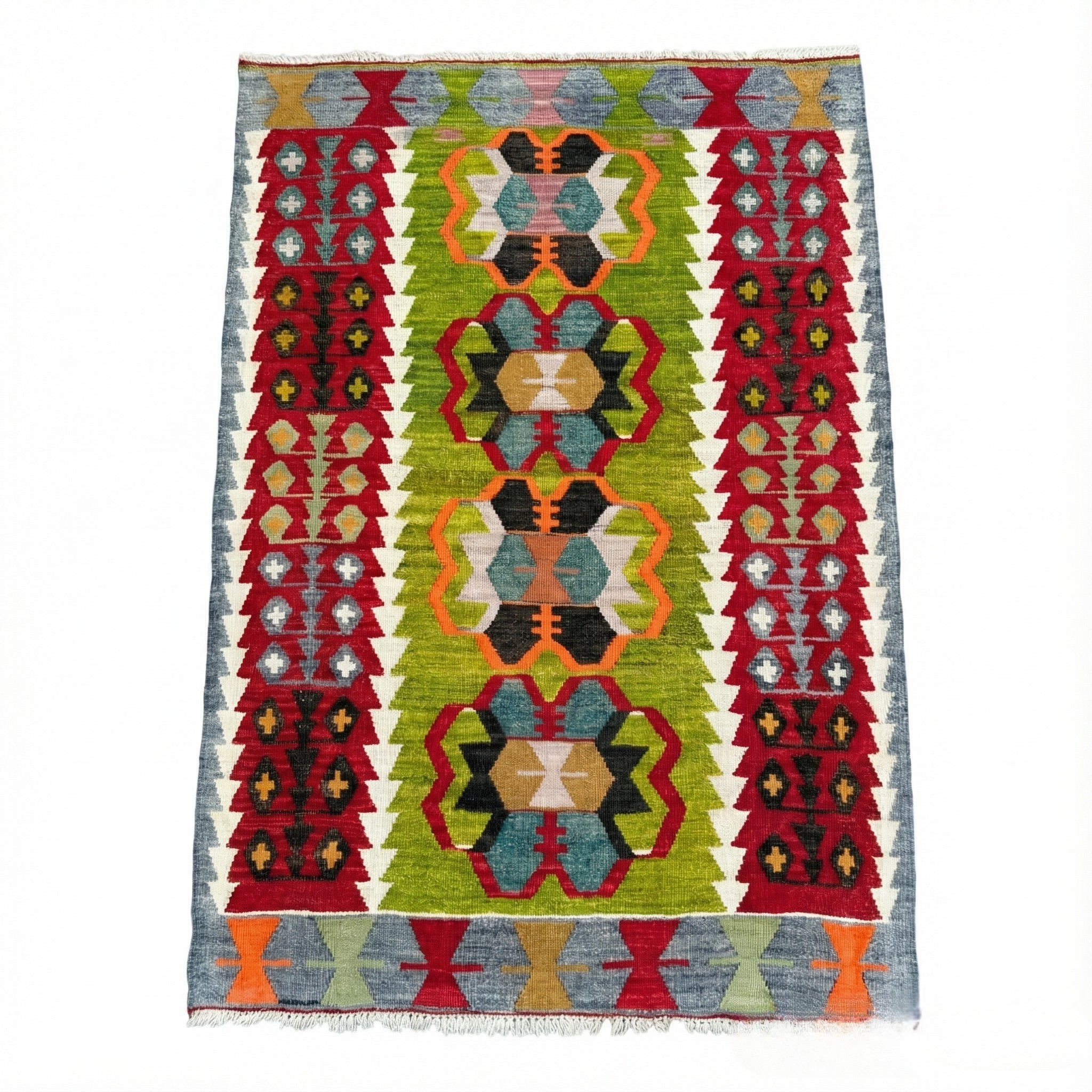 Vintage handwoven Turkish Eşme kilim rug with a bright green center field featuring geometric medallions and deep red borders. Small boho area rug or wall hanging in green, red, and blue wool.
